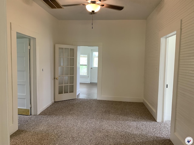 3619 Fm 251, Atlanta, TX 75551 - carpeted empty room featuring baseboards, visible vents, and a ceiling fan