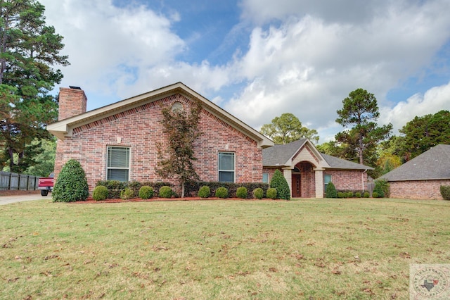 view of property featuring a front yard