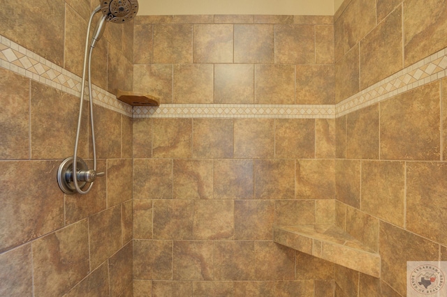 details featuring a tile shower