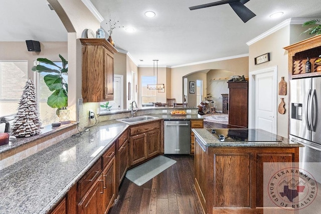 9891 County Rd 2422, Royse City, TX 75189 - kitchen with sink, decorative light fixtures, light stone counters, dark hardwood / wood-style floors, and stainless steel appliances