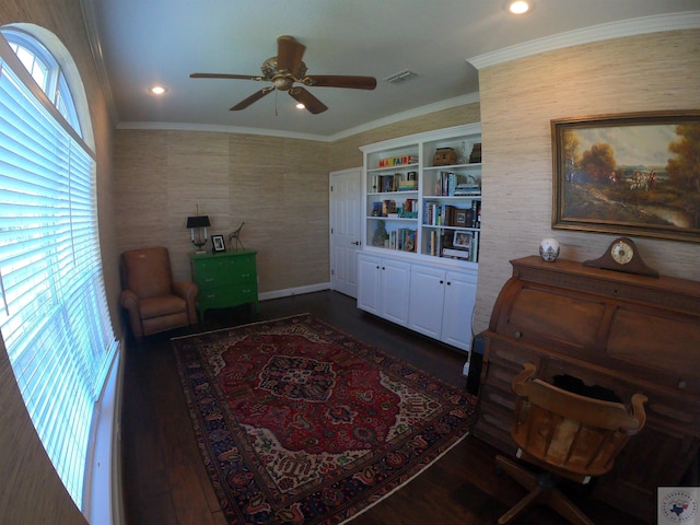 living area with ceiling fan, dark hardwood / wood-style floors, and ornamental molding