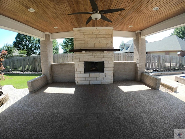 view of patio featuring ceiling fan