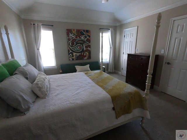 bedroom with ornamental molding, carpet floors, and lofted ceiling