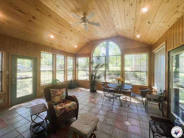 sunroom / solarium featuring recessed lighting, wooden walls, wood ceiling, and vaulted ceiling
