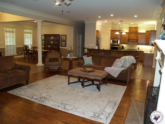 7 River Plantation, Texarkana, TX 75503 - living area with ornamental molding, ornate columns, wood finished floors, ceiling fan, and recessed lighting