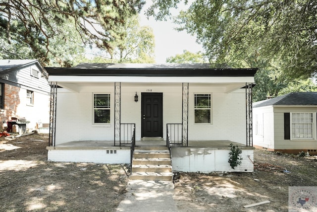 bungalow-style home with a porch