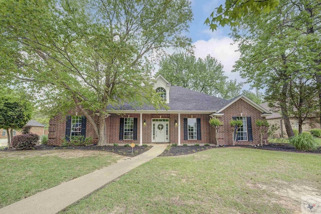 4 Whitney Cir, Texarkana, TX 75503 - single story home with brick siding, a shingled roof, and a front yard