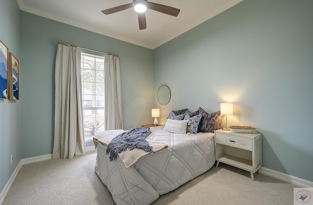 bedroom featuring ceiling fan, baseboards, light carpet, and ornamental molding