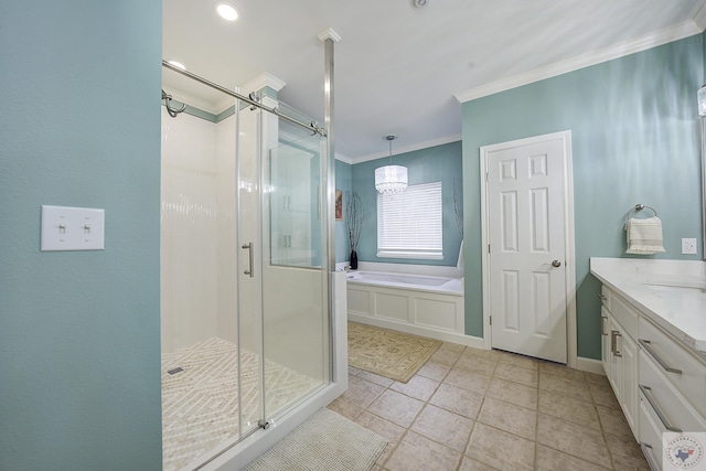 bathroom with a garden tub, ornamental molding, a shower stall, tile patterned flooring, and vanity