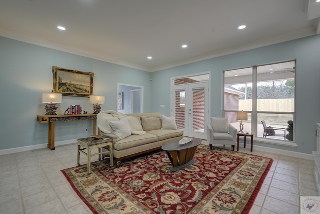 living room with french doors, a wealth of natural light, and ornamental molding