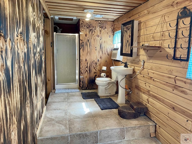 bathroom featuring wood walls, a shower with door, toilet, and cooling unit