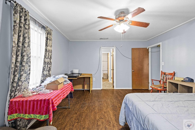 bedroom with dark wood-type flooring and ceiling fan