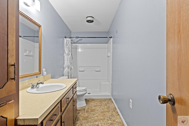 bathroom with vanity, toilet, and a shower with shower curtain