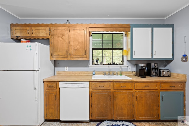 kitchen with sink, white appliances, and ornamental molding