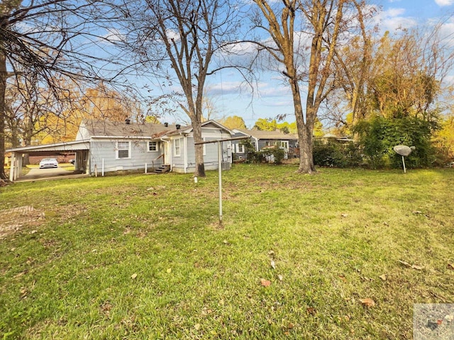 view of yard featuring a carport