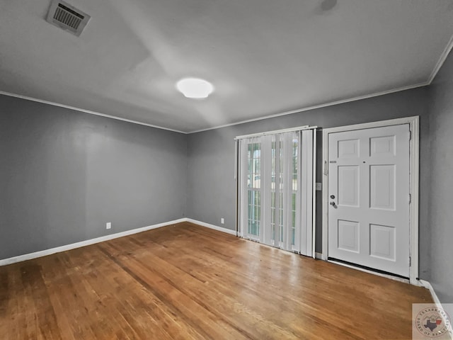 unfurnished room featuring wood-type flooring