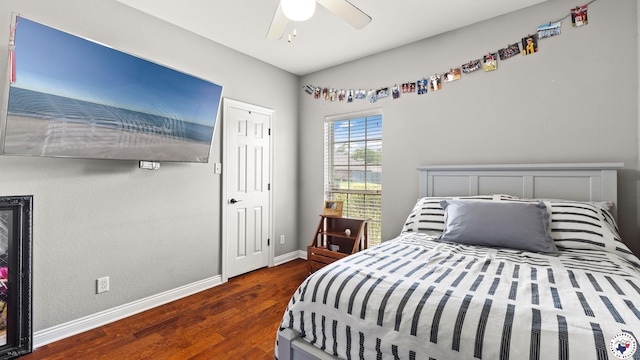 6914 Manor Crest Dr, Texarkana, AR 71854 - bedroom featuring wood finished floors, baseboards, and a ceiling fan