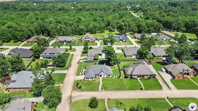 6914 Manor Crest Dr, Texarkana, AR 71854 - aerial view of property's location with nearby suburban area and a heavily wooded area