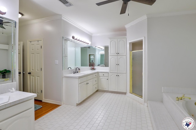 16 Bill Rogers Dr, Texarkana, TX 75503 - bathroom featuring ceiling fan, a garden tub, a stall shower, crown molding, and vanity