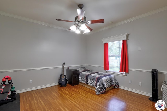 16 Bill Rogers Dr, Texarkana, TX 75503 - bedroom featuring wood finished floors, ornamental molding, baseboards, and ceiling fan
