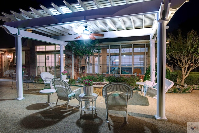 view of patio featuring a pergola and ceiling fan