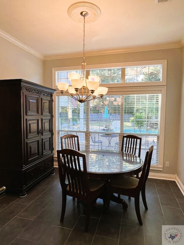 tiled dining space featuring a notable chandelier and ornamental molding