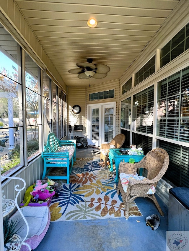 sunroom / solarium with ceiling fan and plenty of natural light