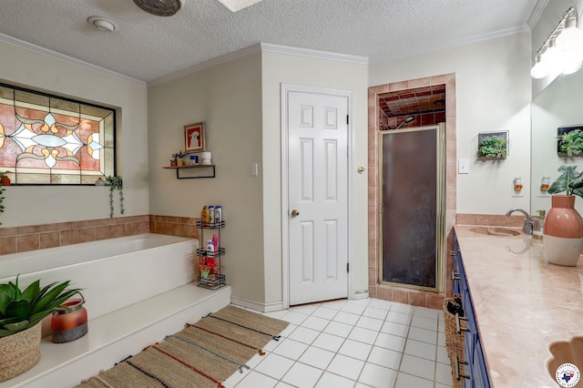 3502 Tiffany Ln, Texarkana, AR 71854 - full bathroom featuring a stall shower, double vanity, a garden tub, a textured ceiling, and tile patterned floors