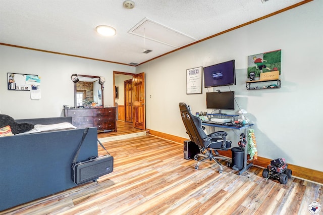 3502 Tiffany Ln, Texarkana, AR 71854 - office area featuring attic access, crown molding, wood finished floors, baseboards, and a textured ceiling