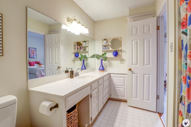 3502 Tiffany Ln, Texarkana, AR 71854 - full bath with toilet, tile patterned flooring, and vanity