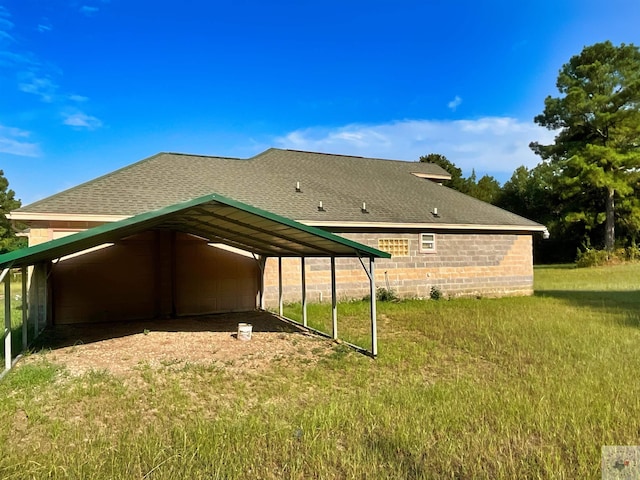 rear view of house featuring a carport