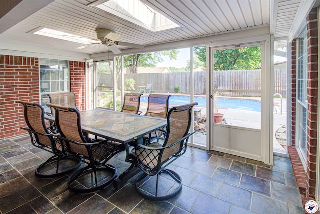 14 White Willow Pl, Texarkana, AR 71854 - sunroom / solarium featuring a skylight, a ceiling fan, and outdoor dining area