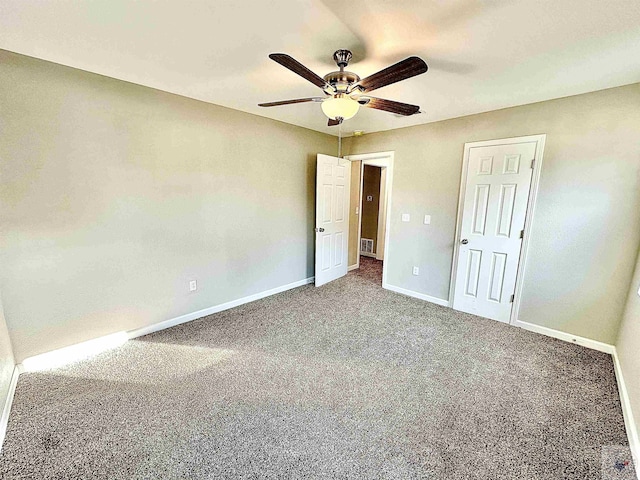 unfurnished bedroom featuring a closet, ceiling fan, and carpet flooring