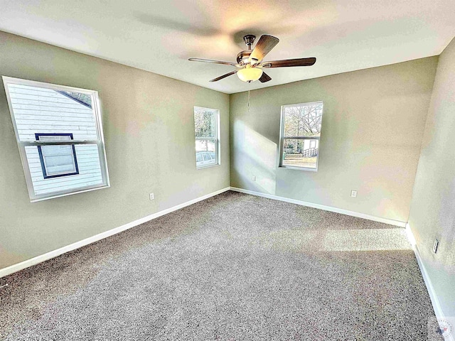 unfurnished room featuring ceiling fan