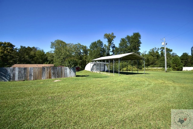 view of yard with a carport