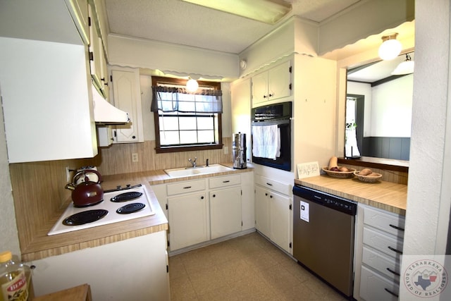 kitchen featuring dishwasher, white cabinetry, sink, white electric stovetop, and black oven