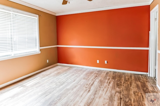 unfurnished room featuring crown molding, ceiling fan, and hardwood / wood-style flooring