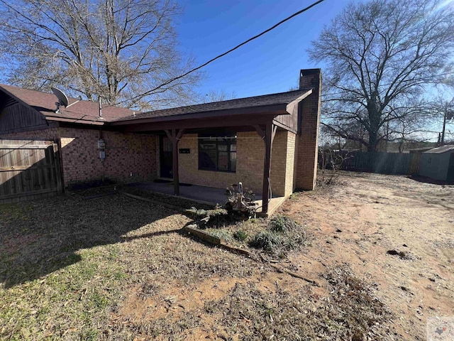 rear view of property with a patio area