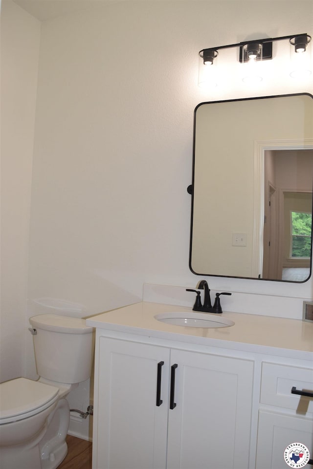 105 Bronco, Texarkana, TX 75503 - bathroom featuring toilet and vanity