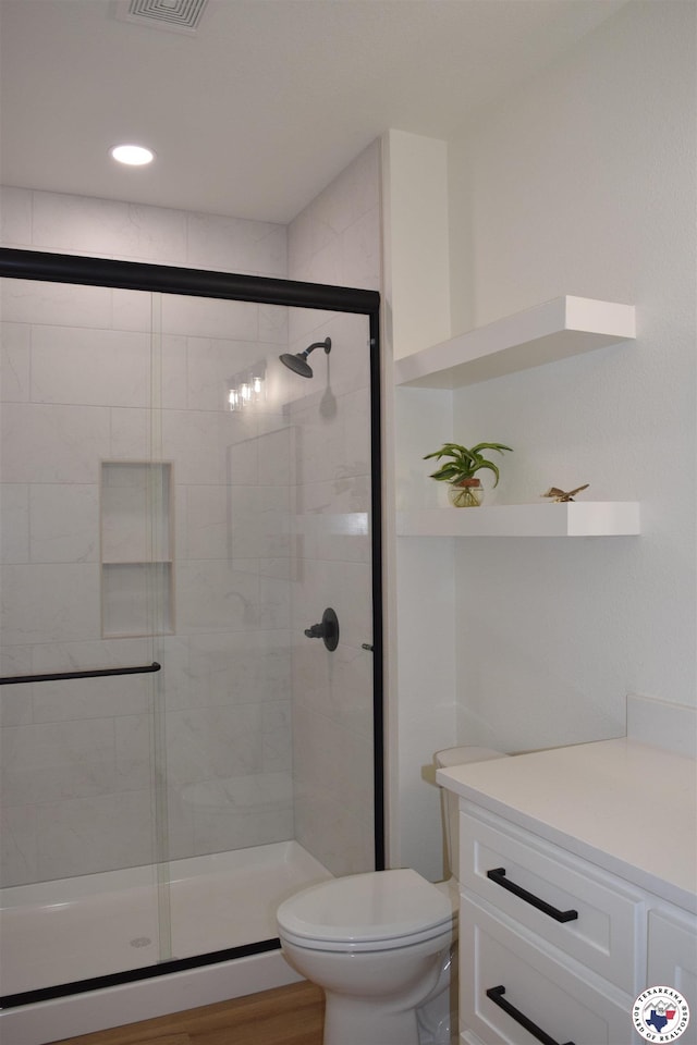 105 Bronco, Texarkana, TX 75503 - full bath with a shower stall, toilet, recessed lighting, and vanity