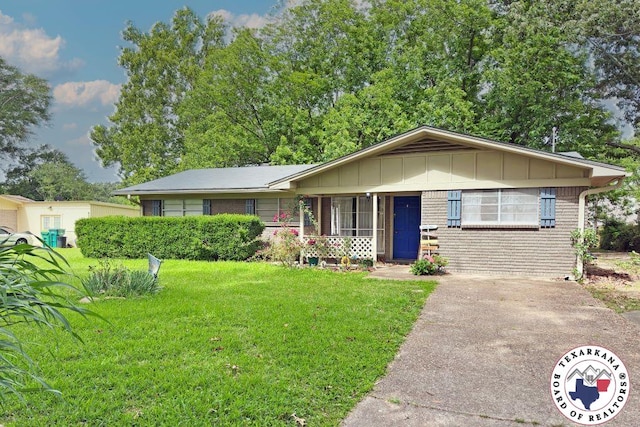 5 Sidney Dr, Texarkana, TX 75503 - view of front of home with a front yard and board and batten siding