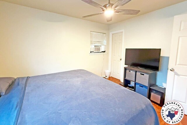5 Sidney Dr, Texarkana, TX 75503 - bedroom featuring ceiling fan, baseboards, and wood finished floors