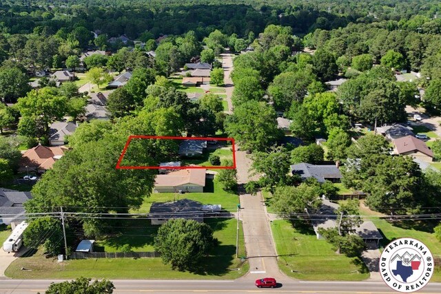 5 Sidney Dr, Texarkana, TX 75503 - aerial perspective of suburban area with property boundaries highlighted and a forest