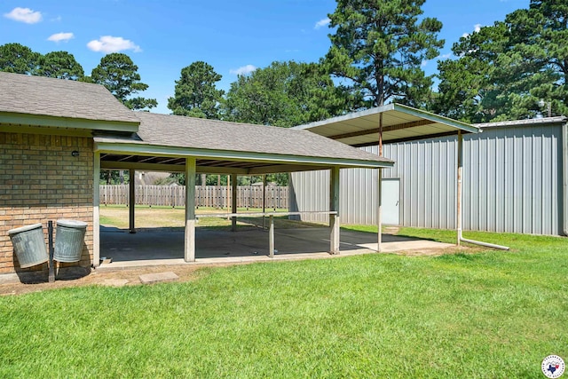 6514 Buchanan Loop, Texarkana, TX 75501 - view of yard with a carport