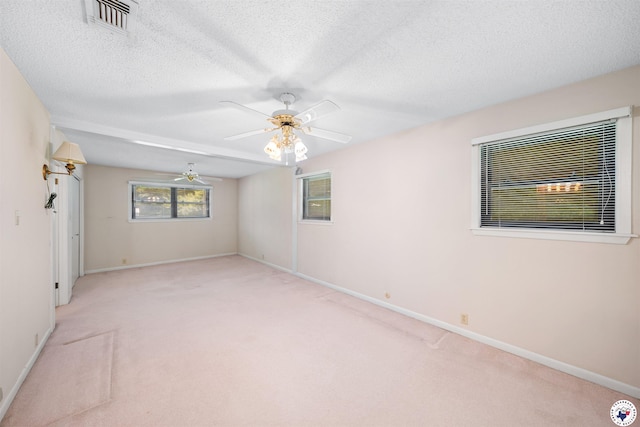 6514 Buchanan Loop, Texarkana, TX 75501 - carpeted empty room with a textured ceiling and ceiling fan
