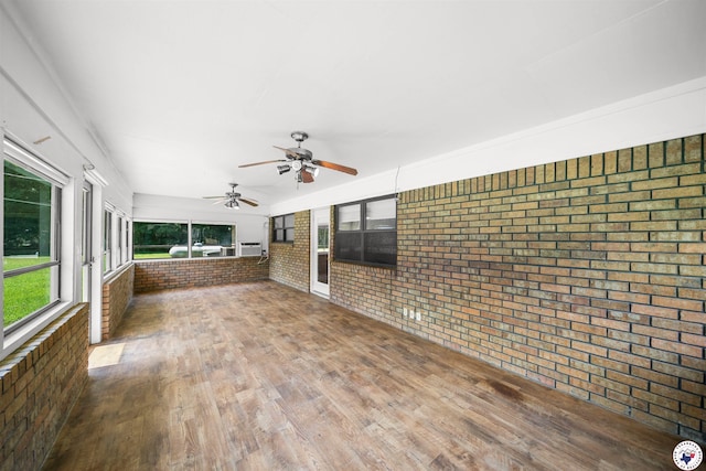 6514 Buchanan Loop, Texarkana, TX 75501 - unfurnished sunroom featuring a ceiling fan