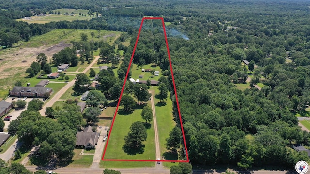 6514 Buchanan Loop, Texarkana, TX 75501 - aerial view of property's location with property parcel outlined and a forest
