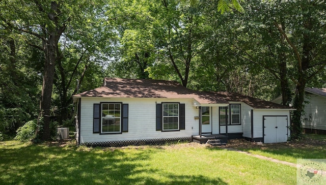 ranch-style home with a front lawn