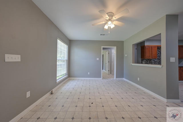 spare room featuring ceiling fan