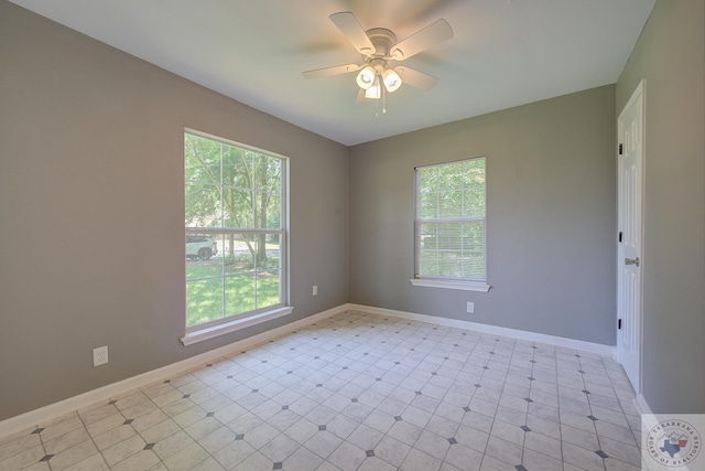 spare room featuring ceiling fan